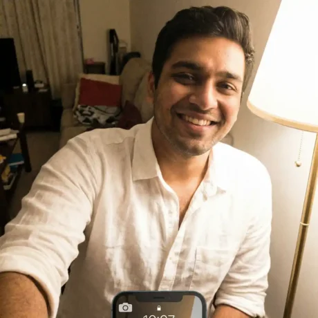 freepik__casual-phone-selfie-of-an-indian-man-in-his-late-2__57435